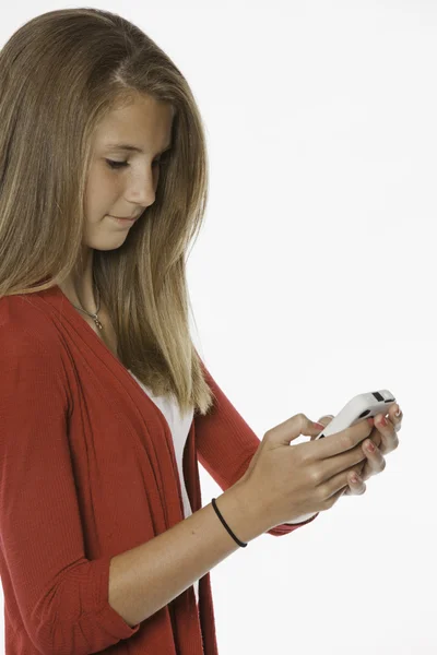 Ragazza adolescente e telefono cellulare — Foto Stock