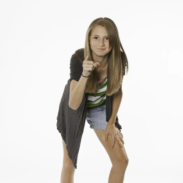 Teenage female pointing isolated on White — Stock Photo, Image