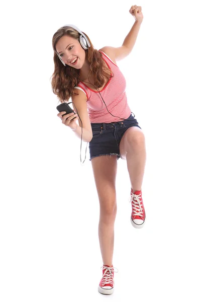 Fun teenage girl dancing with energy to music — Stock Photo, Image