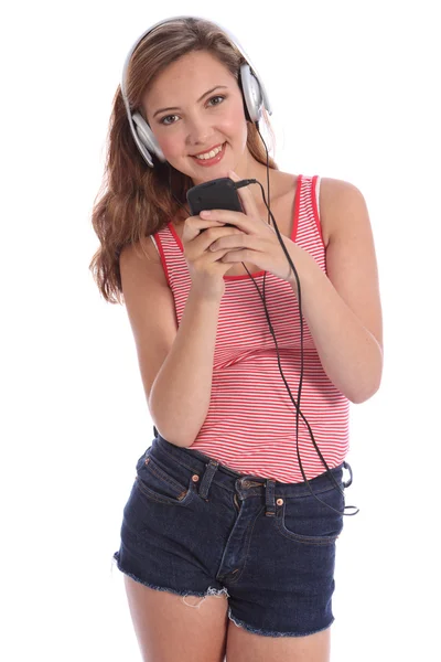 Happy beautiful teenage girl music on headphones — Stock Photo, Image