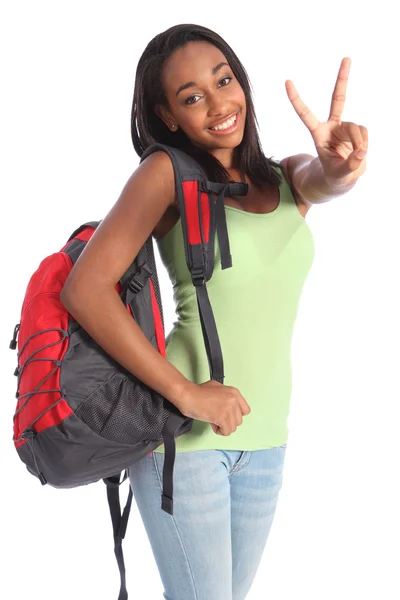 Krásné černé teenager školy dívka vítězství znamení — Stock fotografie