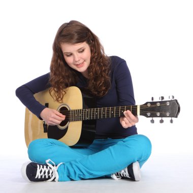 Pretty teenager girl music on acoustic guitar clipart