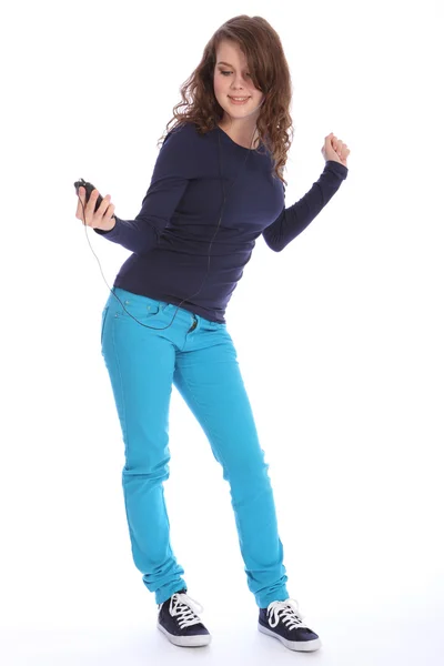 Chica adolescente se divierte bailando al reproductor de música MP3 —  Fotos de Stock