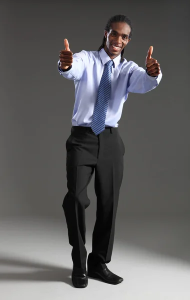 Afro-Amerikaanse zakenman duimschroef opwaarts succes — Stockfoto