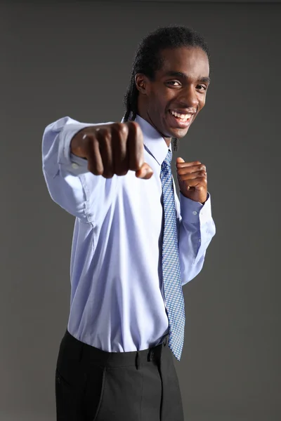 African American businessman fighting success — Stock Photo, Image