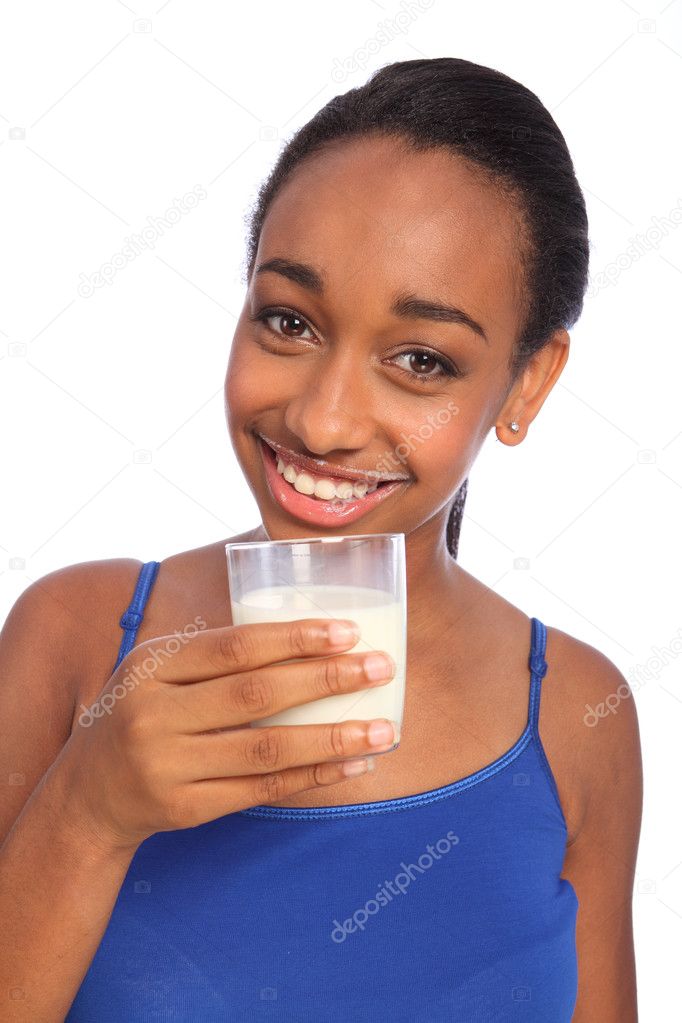 Beautiful smile by young black girl drinking milk