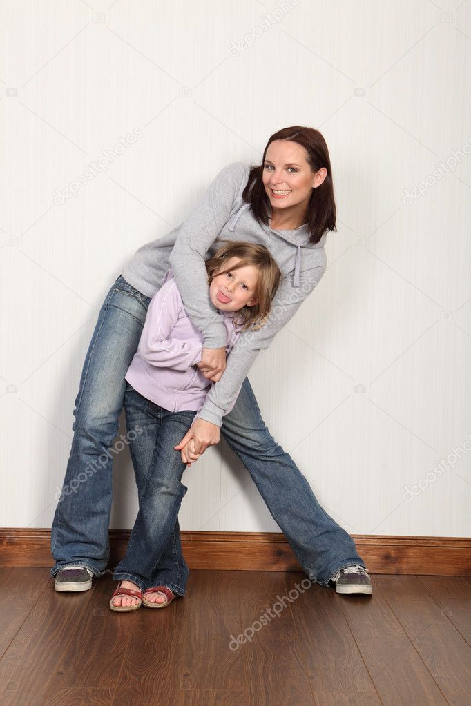 Embrace of family love and fun for mother daughter
