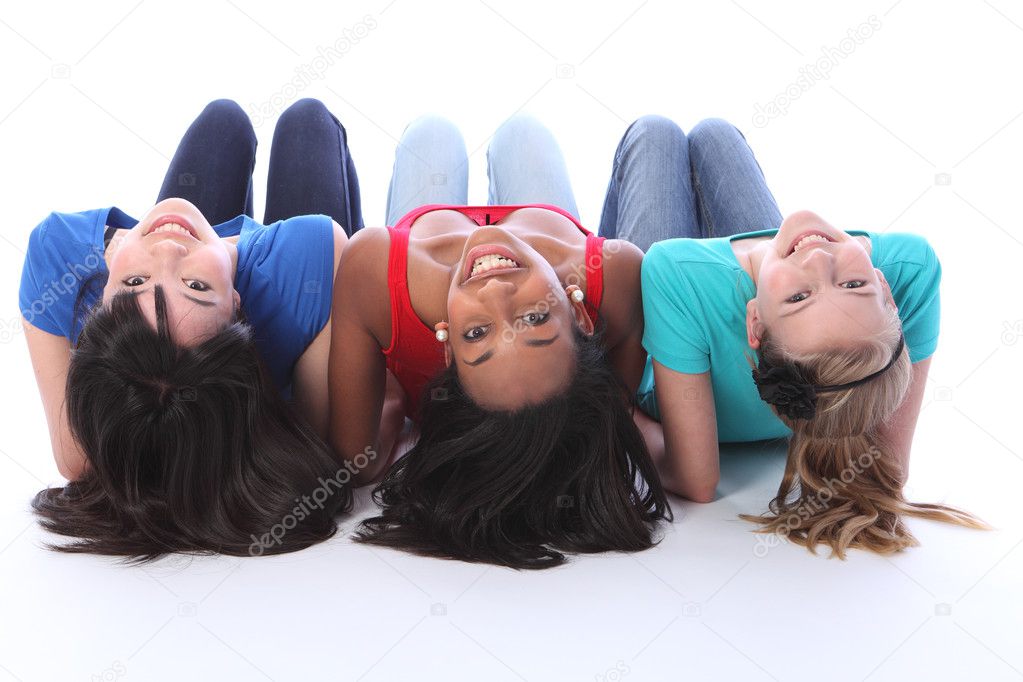 Black white and asian teenage girls having fun