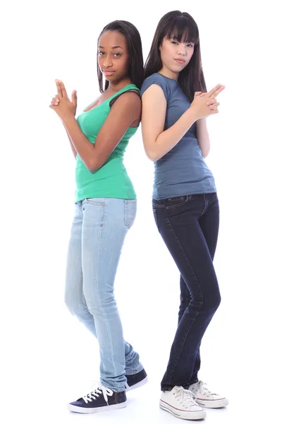 Teenage girls playful secret agent fun gun pose — Stock Photo, Image