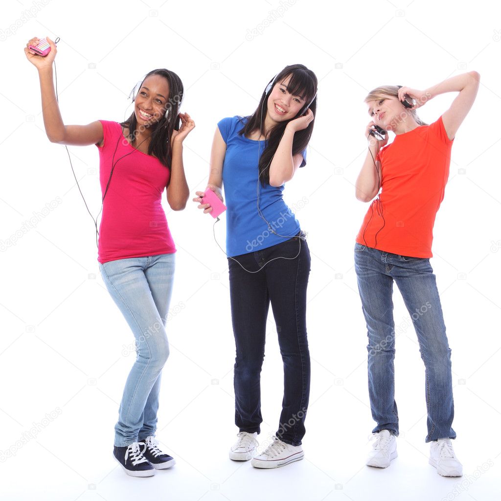 Teenage girls dancing fun to cell phone music