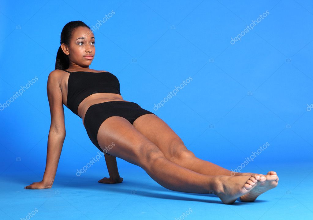 Girl In Underwear Doing A Yoga Stretch Stock Photo, Picture and