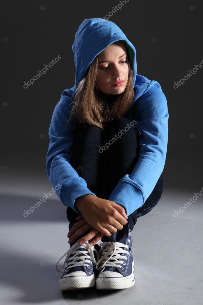 Woman Wearing A Hoodie With A Scar On Her Face Background