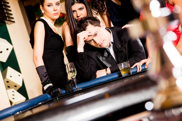 Young behind roulette table — Stock Photo, Image