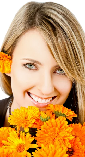Woman with marigolds — Stock Photo, Image
