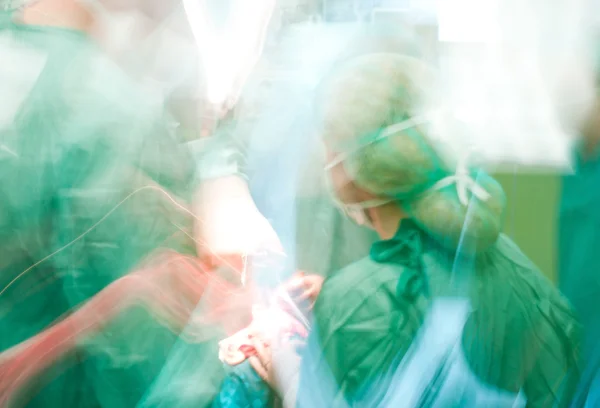 Blurred doctors medical surgery — Stock Photo, Image