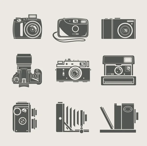 Caméra nouvelle icône et rétro — Image vectorielle