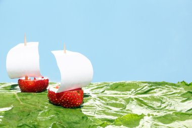 Boats, made of fresh strawberries clipart