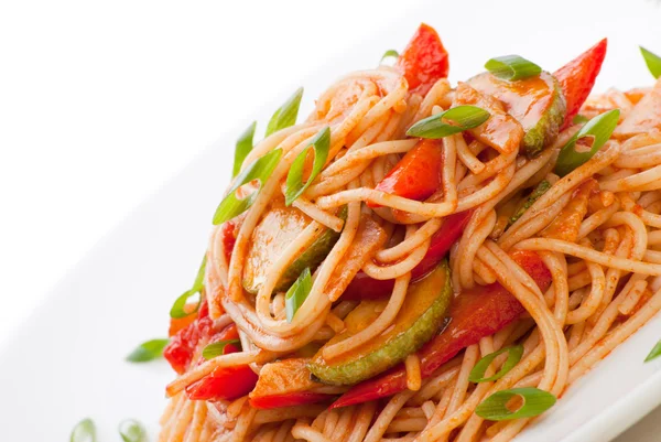 stock image Spaghetti with zucchini and tomato
