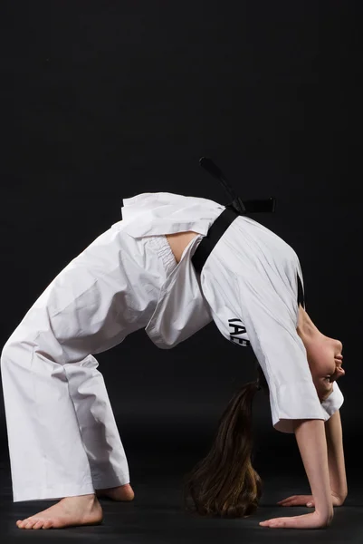stock image Girl in kimono exercising karate kata