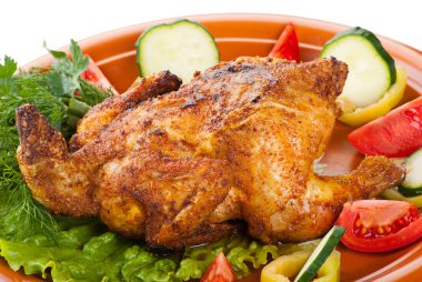 Fresh grilled whole chicken with vegetables clipart