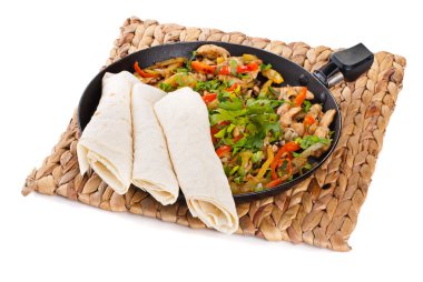 Traditional mexican beef fajitas with tortillas clipart