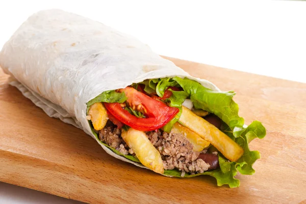 Beef burrito with peppers, fried potato and tomato — Stock Photo, Image