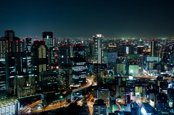 O horizonte de Osaka à noite — Fotografia de Stock
