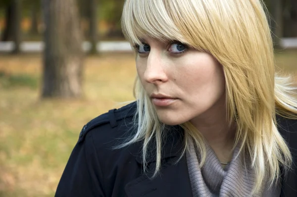 Stock image Woman in autumn park