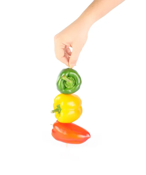 Kleur paprika in de hand — Stockfoto