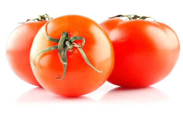 Три помидора — стоковое фото