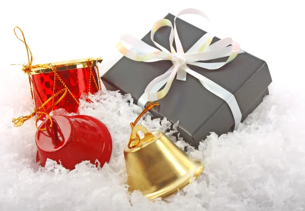 Christmas gift box and bell — Stock Photo, Image