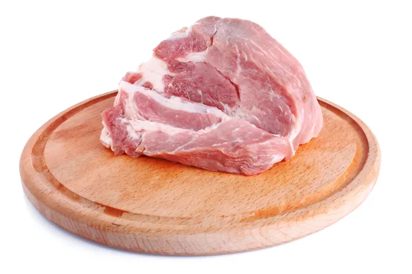 Fresh raw meat big piece on wooden plate — Stock Photo, Image