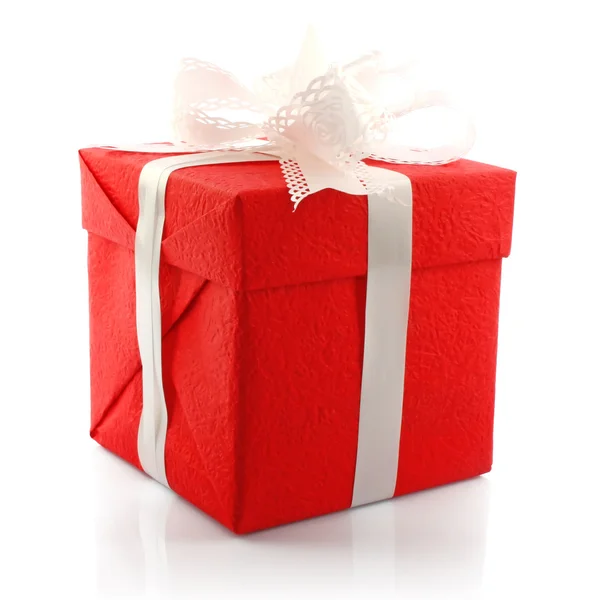Red gift box with white bow — Stock Photo, Image