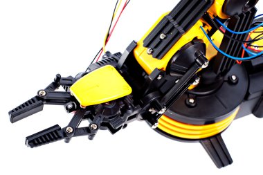 Closeup Black and Yellow Mechanical Robotic Arm