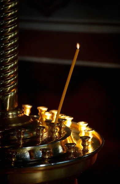 stock image Burning candle in the church