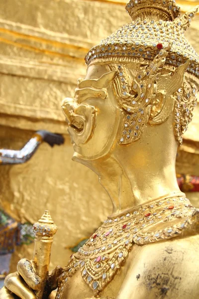 Goldene Kinarri-Statue lizenzfreie Stockfotos
