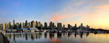 Vancouver skyline at dusk clipart