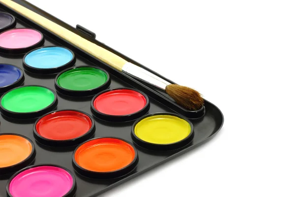 Watercolour paints with brush — Stock Photo, Image