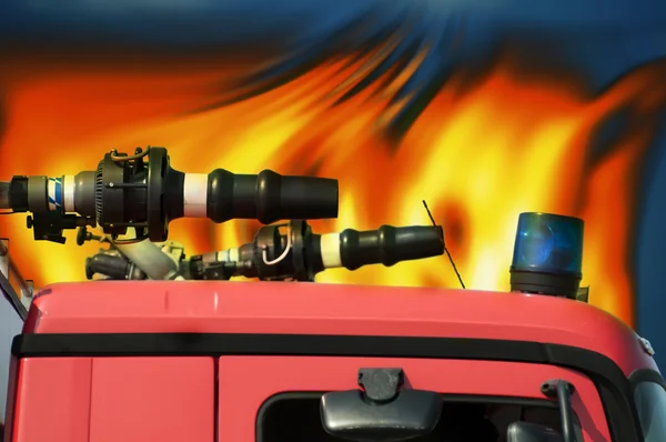 Feuerwehrauto und Flammen — Stockfoto