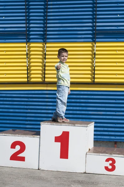 Niño en el podio — Foto de Stock