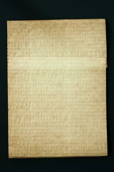 Old worn paper folded — Stock Photo, Image