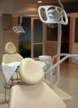 Dental chair and lamp clipart