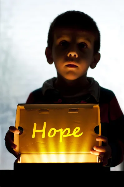 Child and box shine light — Stock Photo, Image