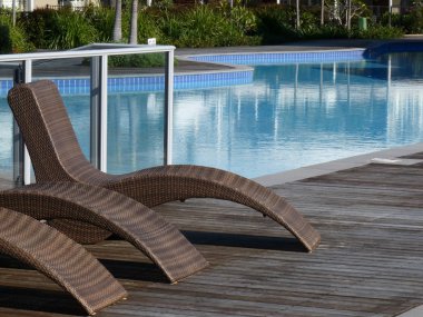 Deckchairs by the pool clipart