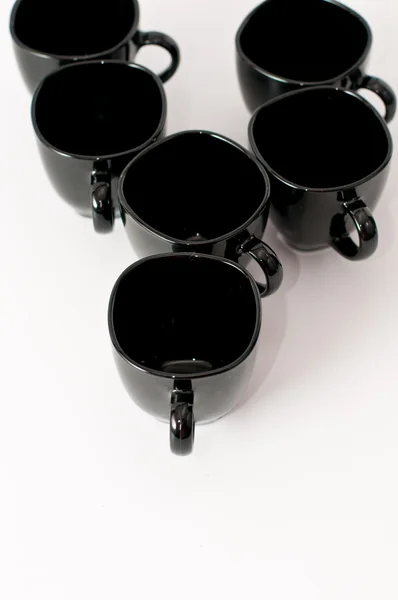 Schwarze Tassen — Stockfoto