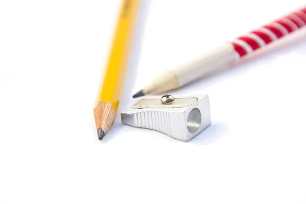 Dwa ołówki i temperówka — Zdjęcie stockowe