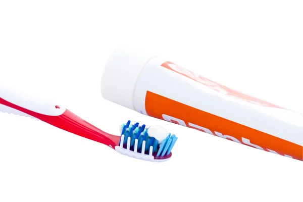 Zahnbürste und Schlauch — Stockfoto