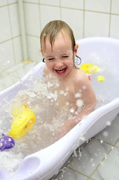 Little girl having fun in the bathroom — Stock Photo, Image