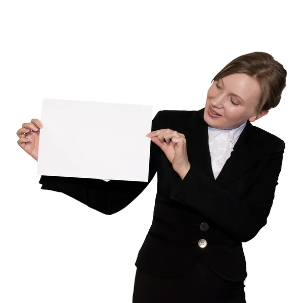 Business women shows a white sheet of paper, isolated on white — Stock Photo, Image