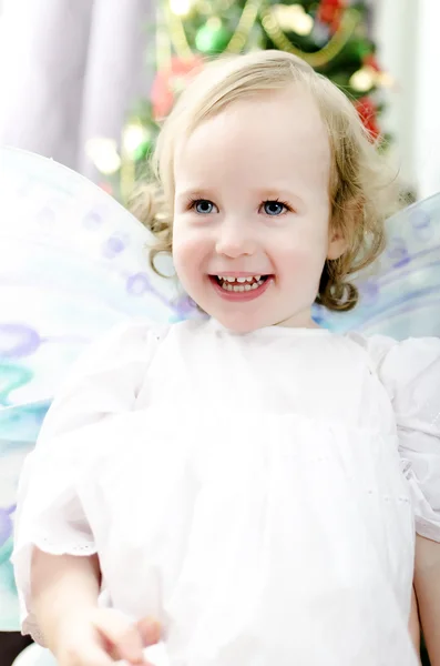 Little girl smiling at Christmas — Stock Photo, Image